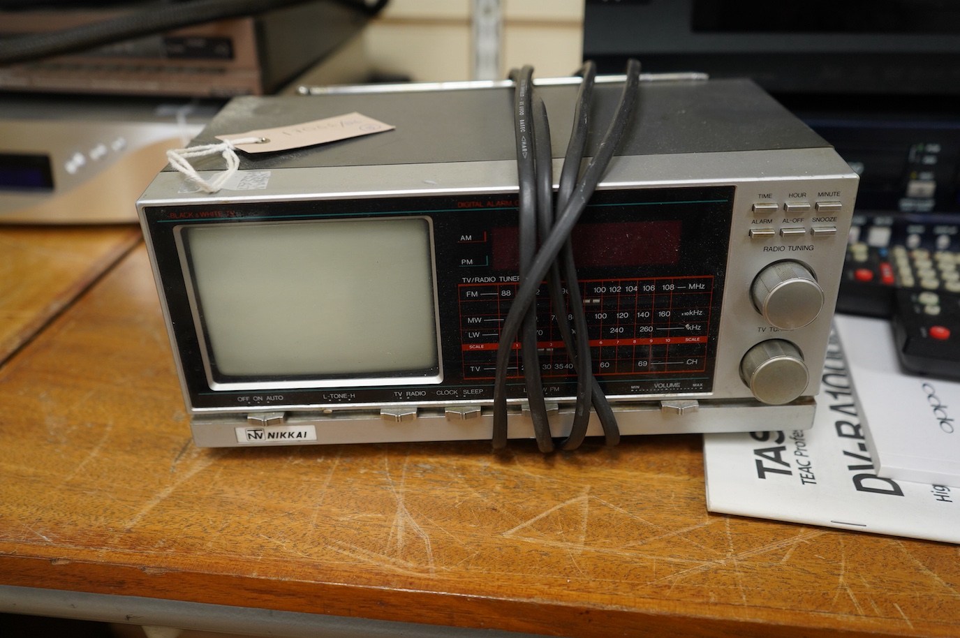 Three Blu-ray/DVD players including; an OPPO BDP-105EU Blu-ray player with user manual and remote control, a Pioneer BDP-LX91 Blu-ray player with remote control, and a Tascam DV-RA1000HD DVD player with owners manual, bu